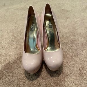 Pink faux leather pumps